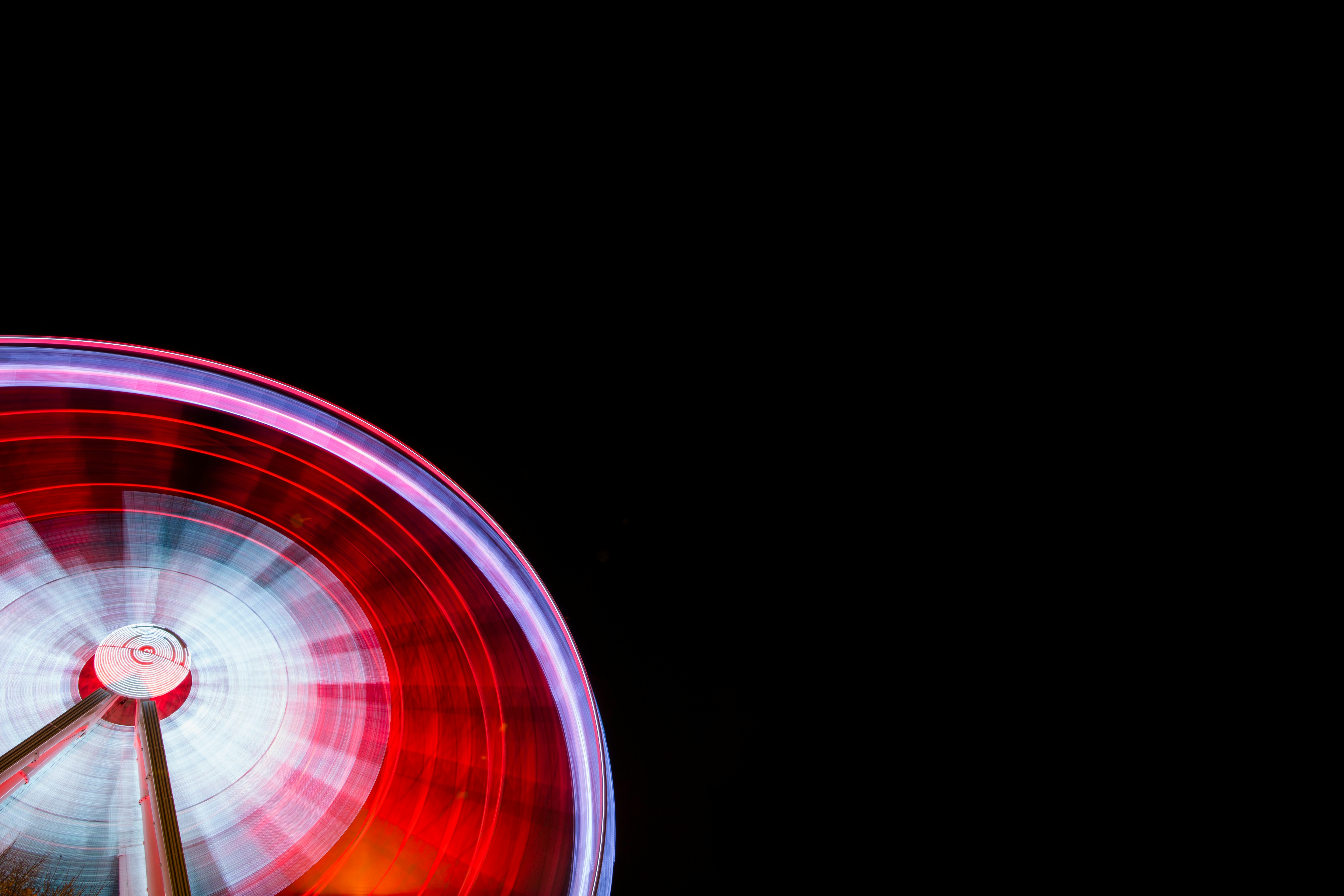 time lapse photography of ferris wheel during nighttime